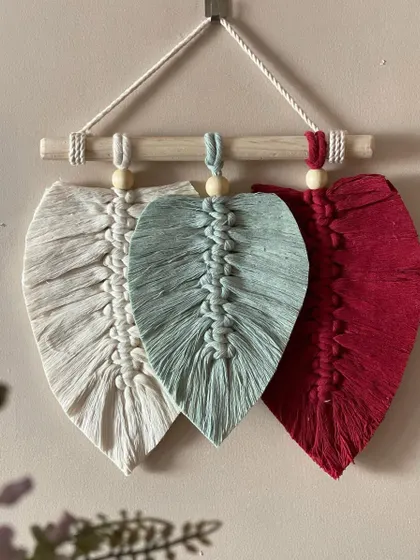 This three-leaf wall hanging in patriotic colors of saffron, white, and green was a popular choice for Independence Day decor.