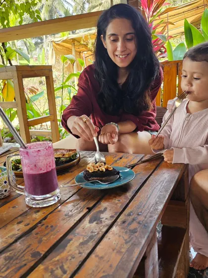 Sharing a healthy dessert with my daughter in Goa. Teaching her about mindful and joyful eating from a young age is very important to me.