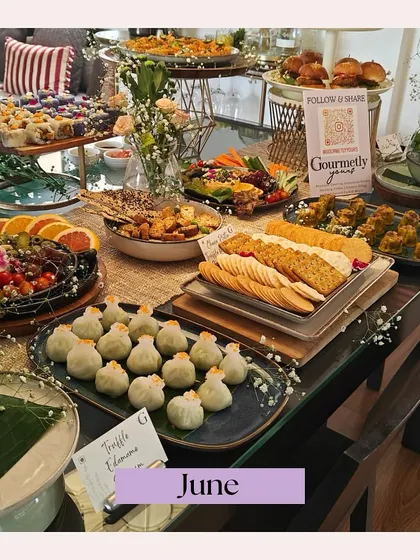 A beautiful grazing table from a June event, featuring Truffle Edamame dim sum and other Asian-inspired delights. This spread highlights our ability to create diverse and delicious menus.