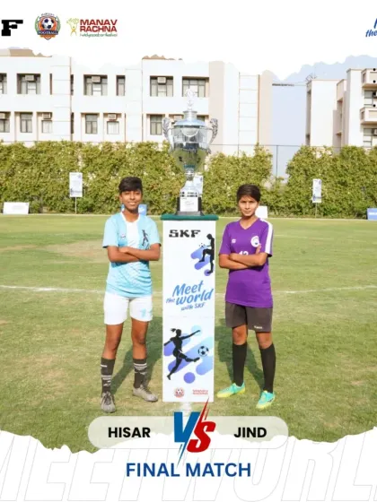 The captains of the final teams stand with the trophy. This iconic shot symbolizes the ultimate prize they are competing for, a chance to play at the Gothia Cup.