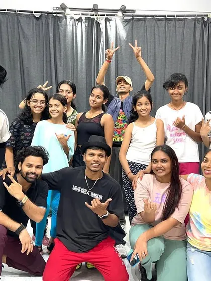 The crew after a successful workshop. It's always a joy to see so many people passionate about learning new choreography.