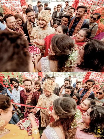 The groom's arrival, surrounded by friends and family. His custom sherwani ensures he is the center of attention, with its rich fabric and detailed craftsmanship shining through.
