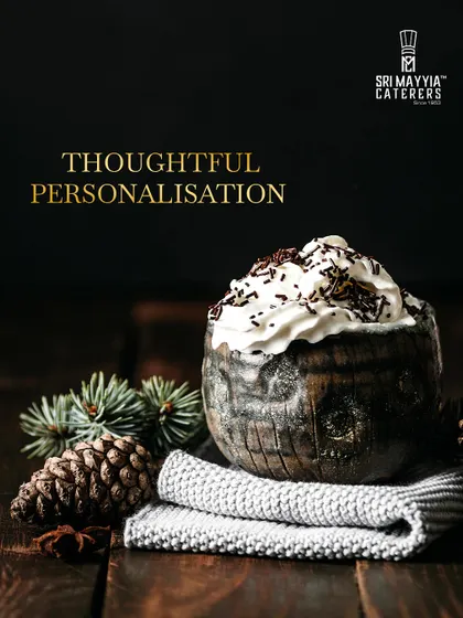 Thoughtful personalization extends to our desserts. Here, a rich chocolate mousse is presented with rustic, winter-themed decor.