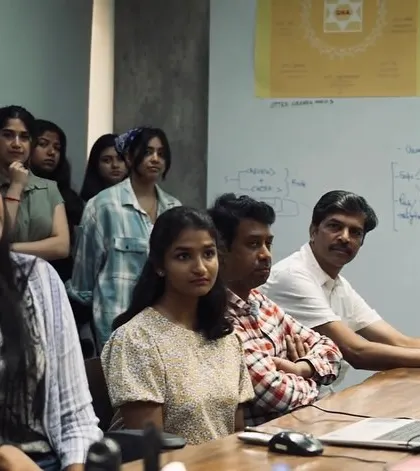 Our team attentively listening during a presentation.