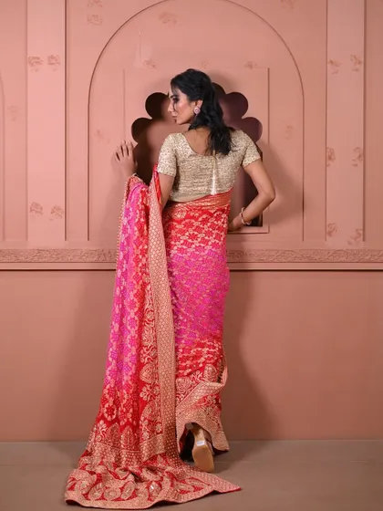 The beauty is in the back details too. This look showcases the elegant fall of the saree's pallu and the intricate design of the blouse, elements I always consider during a styling session.