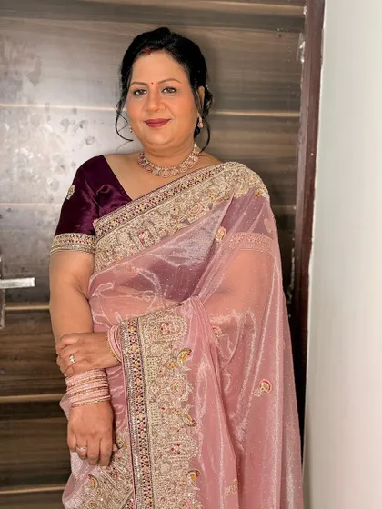 The client smiling, looking confident and beautiful.