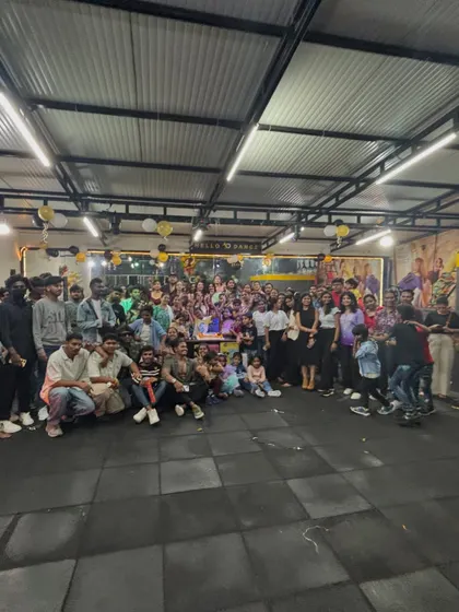 A full-studio group photo from our anniversary event. It's amazing to see how much our community has grown over the years.