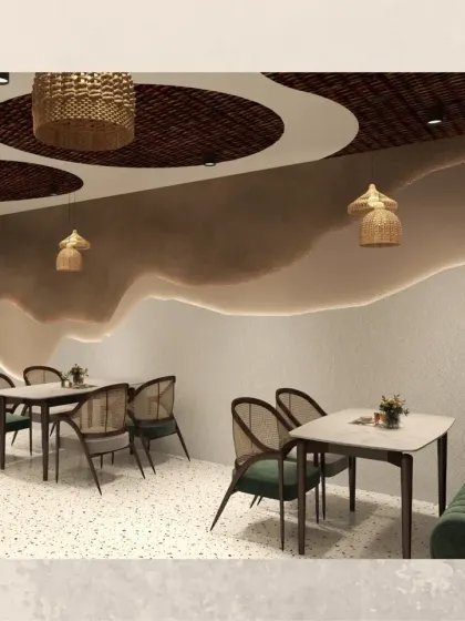 A detail shot of the layered, wave-like wall feature with integrated lighting. This custom element adds a soft, organic feel to the wall, contrasting beautifully with the textured ceiling.