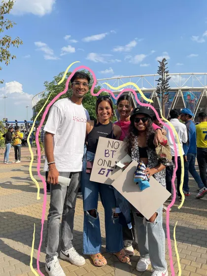 A group photo outside the stadium, with a colorful outline to remember the fun day.