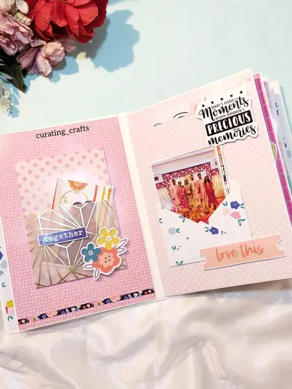 This page uses pockets and tags to tuck away "precious memories" and photos from a bridal celebration.