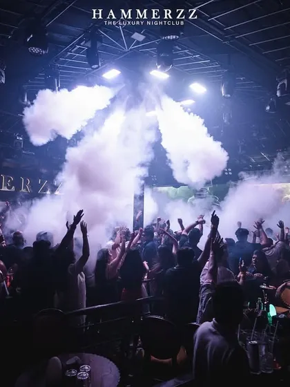 A blast from the smoke cannons at Hammerzz, creating a flower of smoke over the crowd.