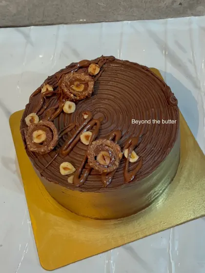 A rich chocolate cake topped with Ferrero Rocher and a drizzle of Nutella. The combination of hazelnut and chocolate is always a winner.