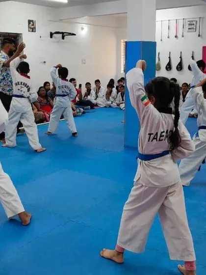 Students practicing an upper block.
