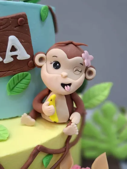 A close-up of the cheeky monkey figurine.