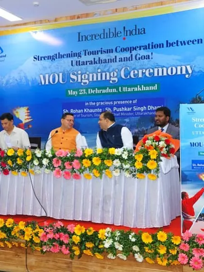 A full view of the dais during the Incredible India tourism cooperation event. I ensure a formal and respectful atmosphere is maintained throughout such official proceedings.