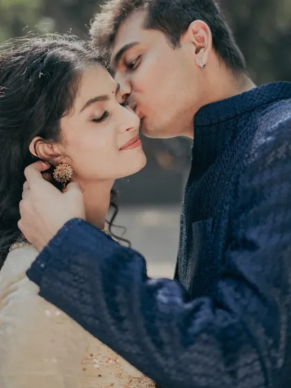 You glow differently when you're with your forever love. A tender moment from an engagement shoot, where the makeup is soft, romantic, and enhances her natural happiness.
