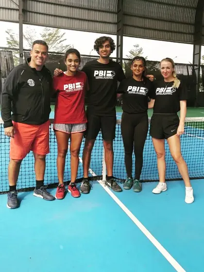 Our coach with a group of our high-performance players, including visiting pro Diana Marcinkevica, after an amazing training camp.