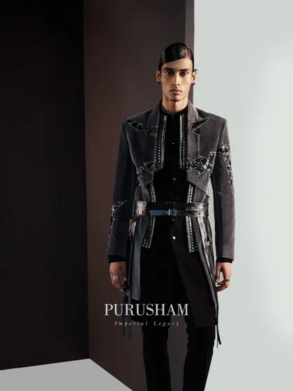 Elevate your style with luxurious hand-embroidered velvet. This grey jacket features a modern, cropped silhouette with a harness detail, showcasing how I blend traditional fabrics with contemporary design.