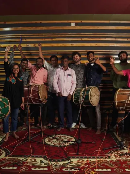 The 'jaathre' or festival vibe is real! This is our amazing team of Dollu players from Sagara, bringing their incredible energy to the studio. My sessions are about this kind of joy and community, celebrating the rich folk rhythms of my homeland.
