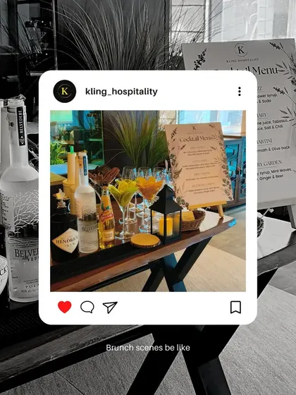 A stylish brunch scene from a corporate gathering. The image highlights a well-appointed bar with premium spirits like Hendrick's and Belvedere, along with a custom cocktail menu, setting the tone for a relaxed networking event.