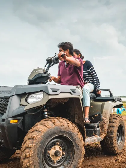 Another angle of our two-seater ATV, perfect for colleagues to pair up and navigate the course together. It encourages communication and cooperation in a fun setting.