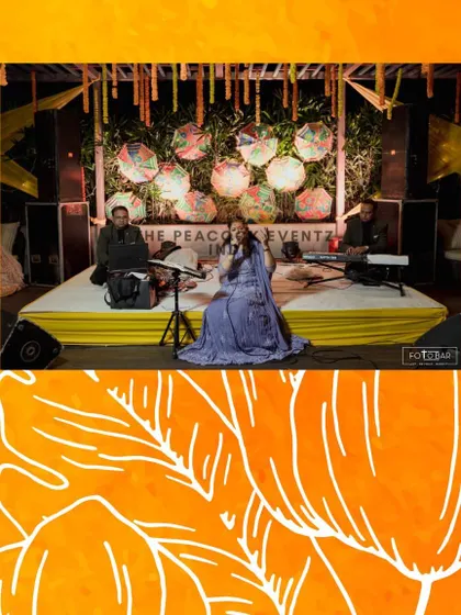 Entertainment is a key part of the Haldi fun. I arranged for a live singer to perform on a stage decorated with colorful Rajasthani umbrellas, adding to the joyful and traditional atmosphere.