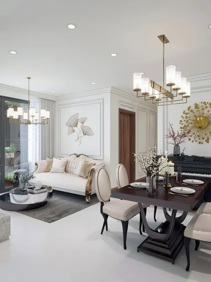 A neo-classical living and dining space. We used wall moldings, elegant chandeliers, and classic furniture to create a timeless and sophisticated interior.