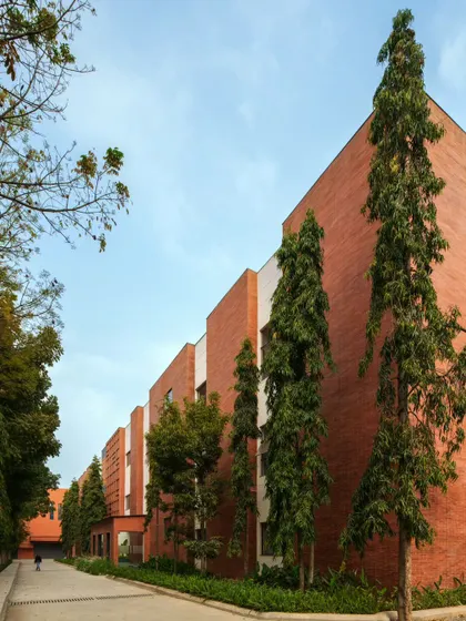 The Canteen and Office block at Campus Biovet in Malur, a 45,000 sq. ft. building housing offices, an auditorium, and a canteen. The facade features our signature double-walled brick cladding, reflecting the post-industrial landscape of the region.