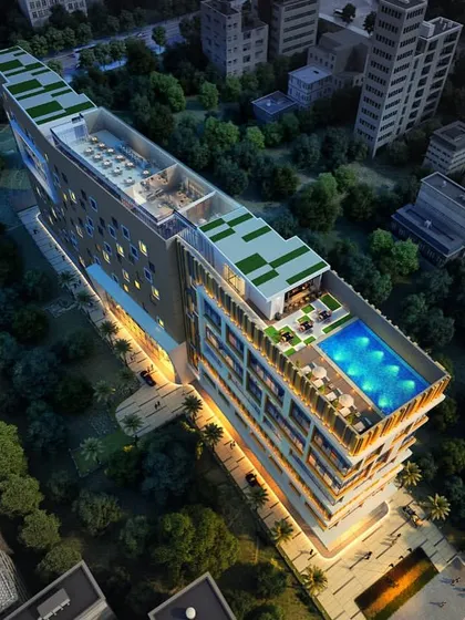 An aerial render of a hotel, showing the rooftop pool and amenity deck.