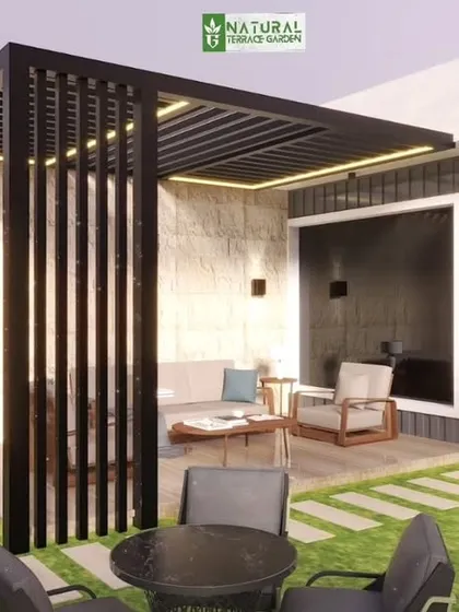 A sleek black pergola with a comfortable seating area, designed for a compact terrace in Model Town.