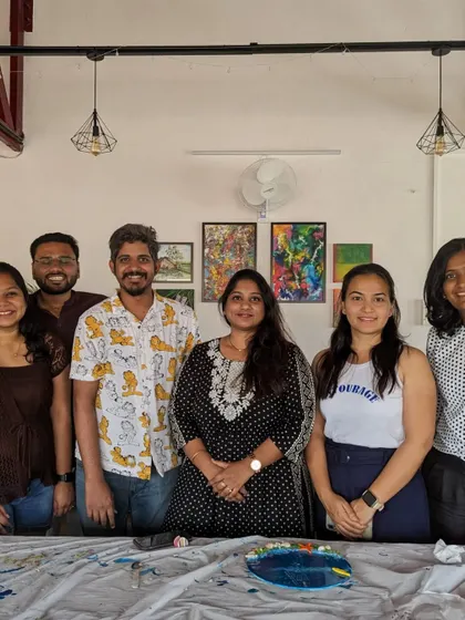A group photo of our happy resin art workshop participants. It's a great opportunity to meet new people and bond over a shared creative experience.