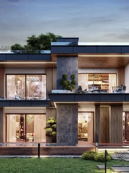 An exterior view of a modern farmhouse-style residence we designed, showcasing multiple balconies, large glass windows, and a seamless integration with the surrounding landscape.