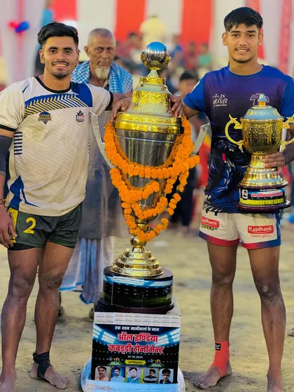 Our players celebrating a double victory: winning the tournament and one of our own being named Best Player of the Tournament.