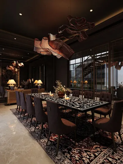 A moody and dramatic dining room concept, where a dark color palette is paired with a sculptural table, ornate rug, and a statement chandelier to create an immersive and luxurious experience.