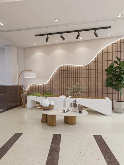 This club features a modern and minimalist design with flowing curves. We used a neutral color palette, terrazzo flooring, and unique lighting to create a chic and dynamic environment for recreation and socializing, including a dedicated game zone.