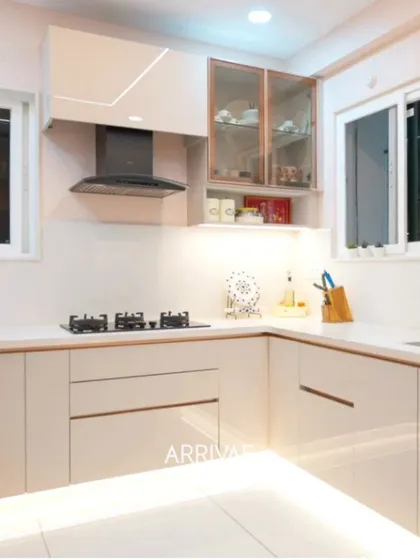 A minimalist's dream, this all-neutral kitchen features handleless cabinets and under-cabinet lighting for a super sleek and clean aesthetic.