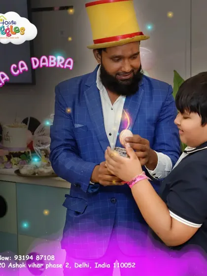 Abra Ca Dabra! We host amazing magic shows that leave kids spellbound. This young assistant is helping our magician with a trick.