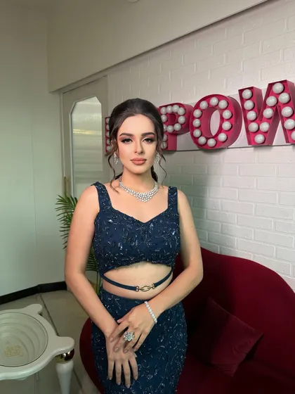 A soft signature glam for a cocktail night. This bride came to us with a vision, and we delivered with sculpted features, defined eyes, and a polished updo that perfectly matched her elegant navy blue gown.