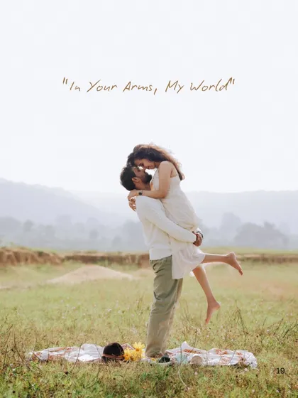 Pure, unscripted joy. This playful lift in an open field captures the carefree spirit and deep affection between a couple, showing that the best moments are often the most spontaneous ones.