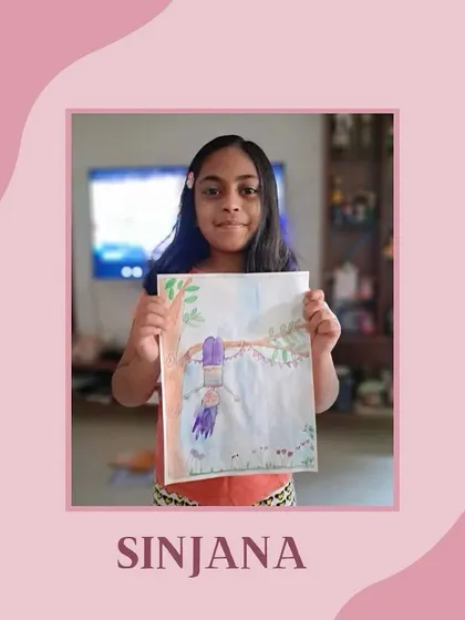 Sinjana with her imaginative drawing. We believe that art is a medium of expression, allowing children to share their thoughts and stories.