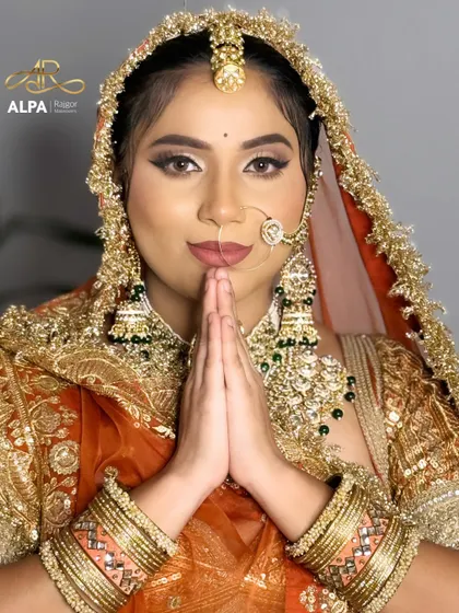 A candid moment showing the bride's happy and confident expression, a testament to feeling beautiful and comfortable in her makeup.