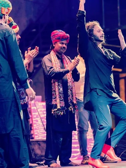A high-energy moment on stage with my Rajasthani folk musicians.