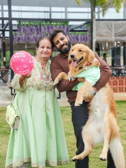 Three generations of family celebrating their furry member's birthday. Our space is designed for the entire family to come together and create happy memories.