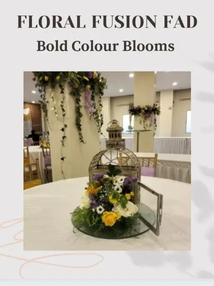 A "Floral Fusion Fad" post showing a centerpiece with bold, contrasting colors in a birdcage, demonstrating a creative way to use vibrant blooms.