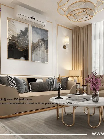 A living room from our 'Traditional Contemporary' 3BHK project in Pune. The space features a curved beige sofa, marble-topped tables with gold frames, and elegant wall moldings.