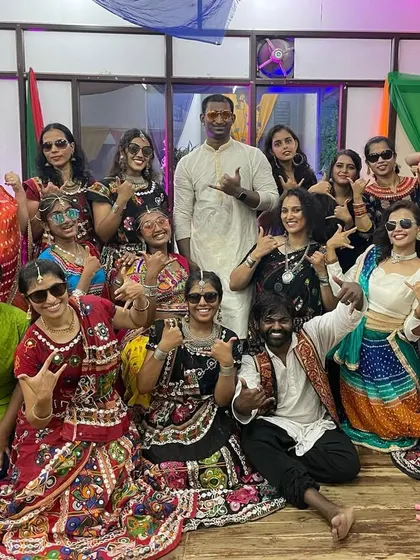 The "cool" group posing with sunglasses at our fun-filled Dandiya night.