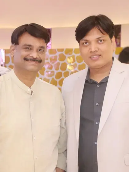 Two guests pose for a photo at a corporate or family event. We cover a wide range of events, from personal parties to office gatherings.