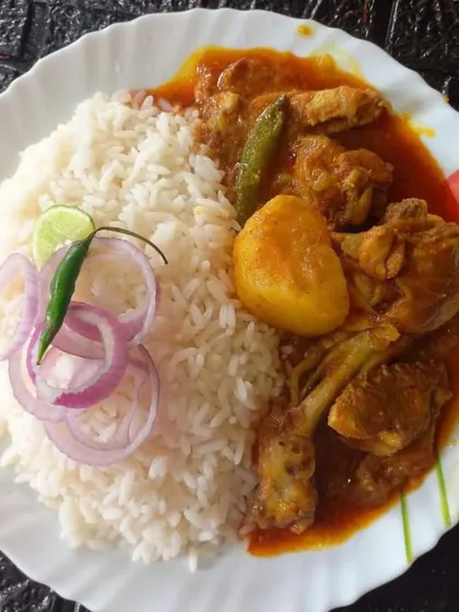 This is my Bengali-style chicken curry, a light yet flavorful dish with potatoes, served with steamed rice. It's a comforting mini meal, perfect for a light but satisfying lunch.