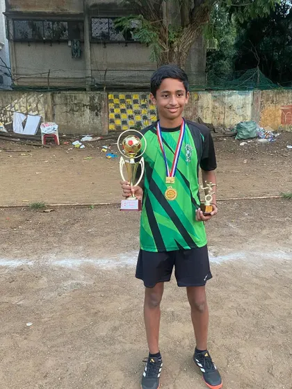 Jordan with his trophies after an outstanding performance in the Bandra football league.