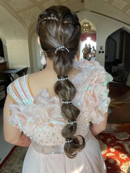 Another angle of the heart-braid and pearl-accented ponytail.